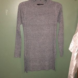 Long sweater with slits in the sides